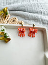 Orange Pearl Bow Dangles